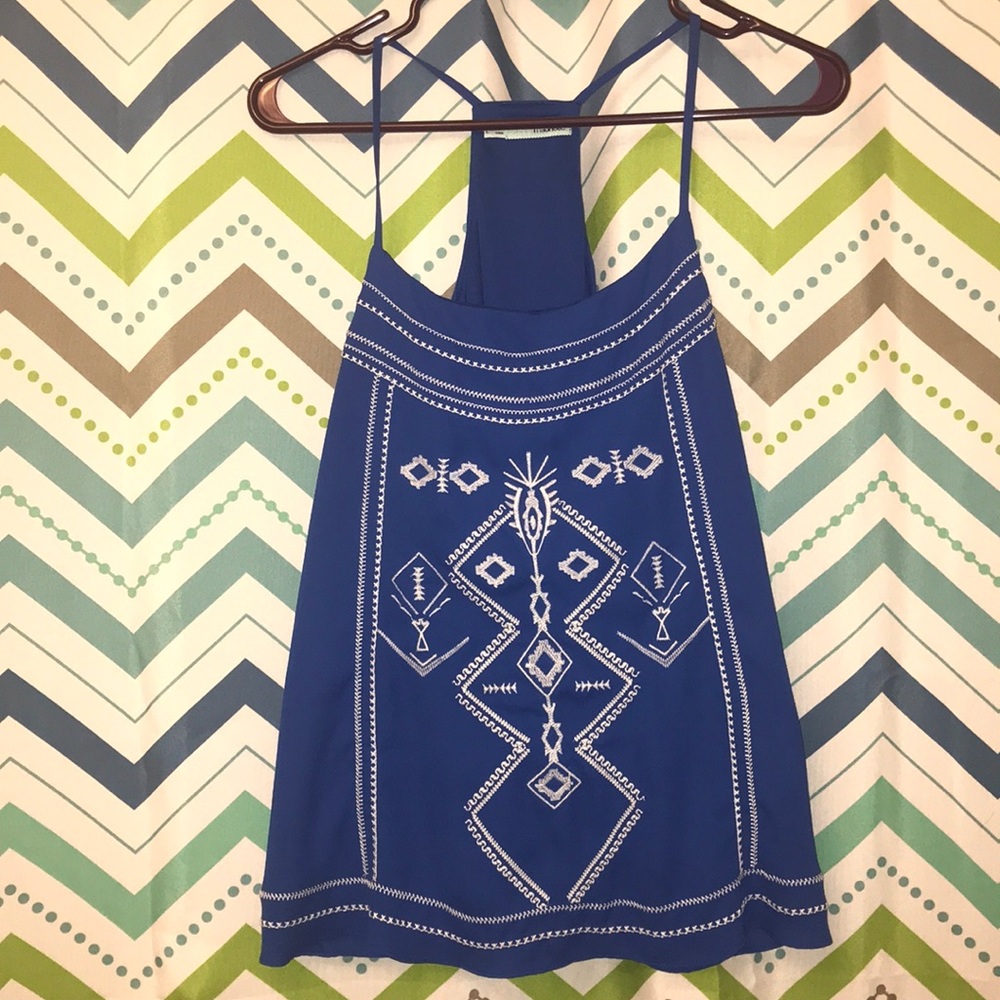 Maurice’s blue patterned blouse